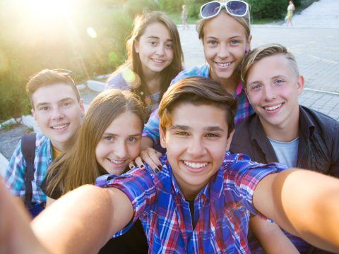 Group,Of,Teenagers,In,The,Park,Do,Selfie